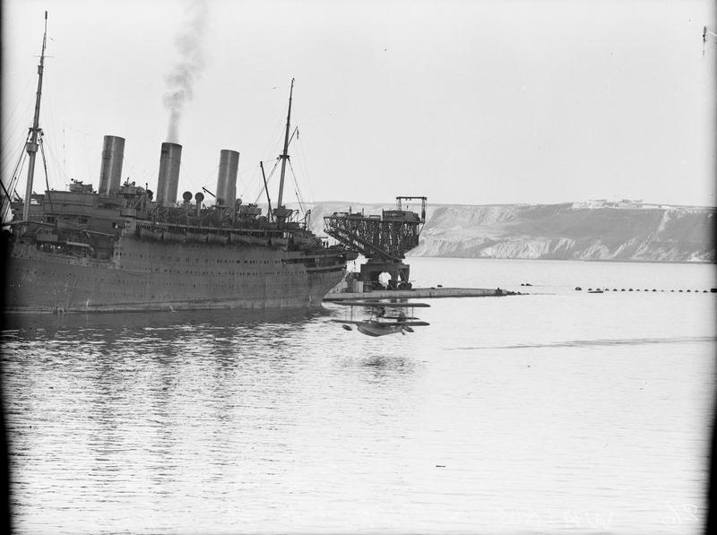 arrivee de — A Supermarine Walrus Airplane Taking Off at Mers-el-kebir, With the Ss Empress of Australia in the Background. 20 January 1943, Mers-el-kebir. A14367