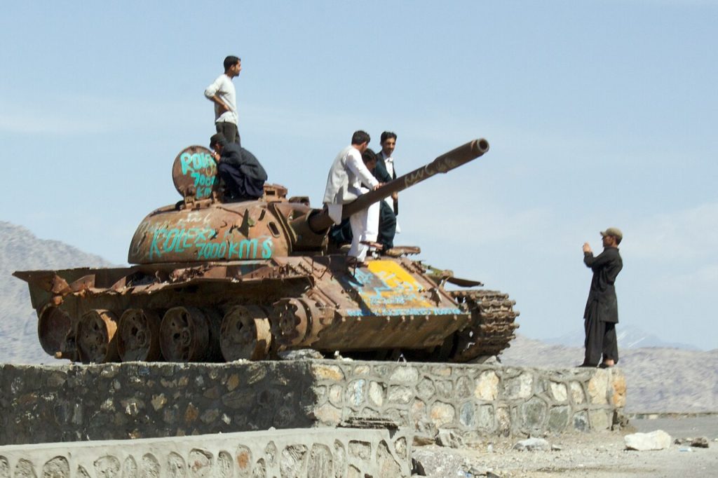 Tourisme Maroc — Destroyed T-55A tank adapted into a tourist attraction in Afghanistan